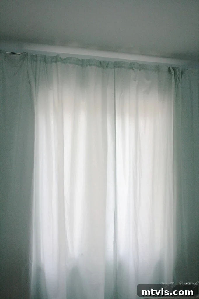 Upcycle Sheets into Stylish Curtains 9 GENIUS! Learn how to make curtains out of sheets! Full tutorial by Designer Trapped in a Lawyer's Body.