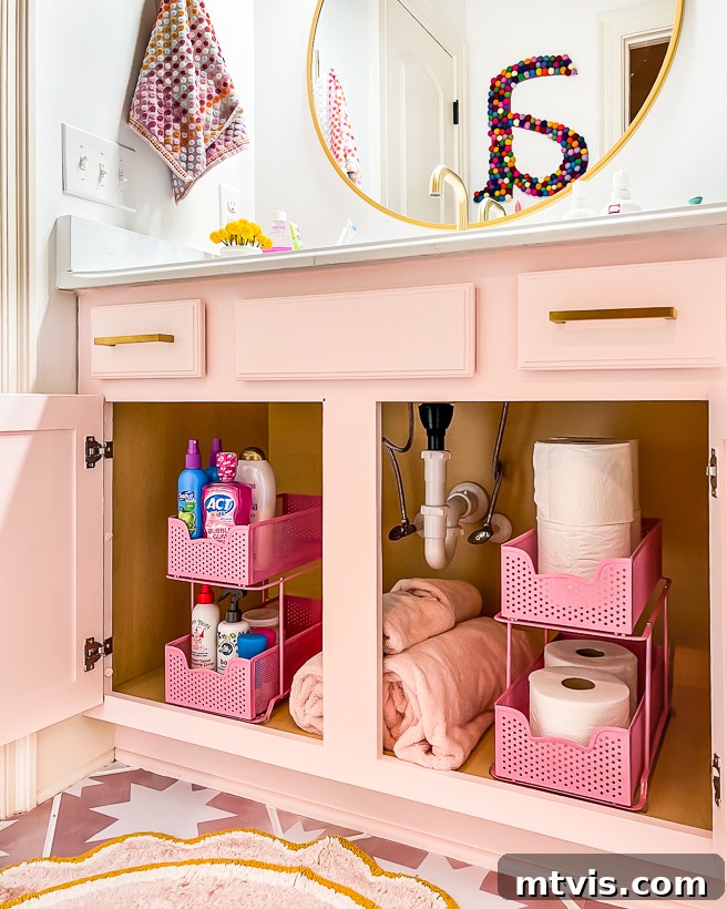 Your Realistic Roadmap to a Decluttered Home 10 Organized and decluttered bathroom cabinet in a girl's bathroom with neatly arranged toiletries