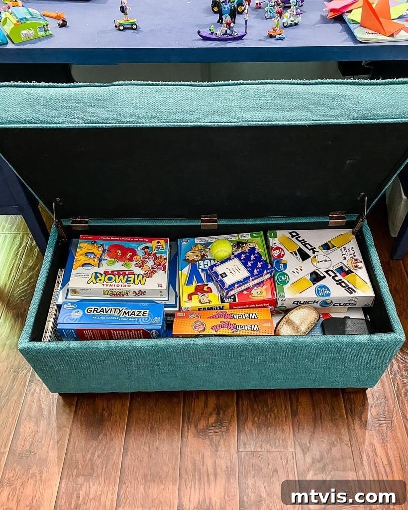 Your Realistic Roadmap to a Decluttered Home 15 Kids' board games and toys hidden in a stylish storage bench in a living room