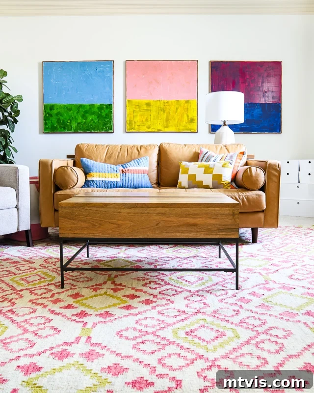 Our Family's Colorful Oasis: A Bonus Room Tour 5 View of the colorful family bonus room by Tasha Agruso, highlighting the seating area and decor