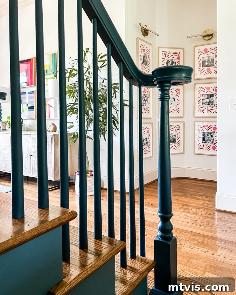 Stair Railing Makeover Replace Balusters for a Fresh Look 14 updated stair railing from entryway view