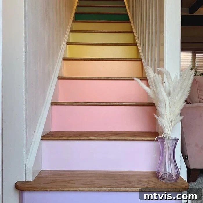 Elevate Your Entryway: Creative Stair Runner Designs 15 A pastel rainbow-painted staircase featuring natural wood treads, beautifully complemented by a purple vase adorned with white feathers. This whimsical design is a creative stair runner idea.