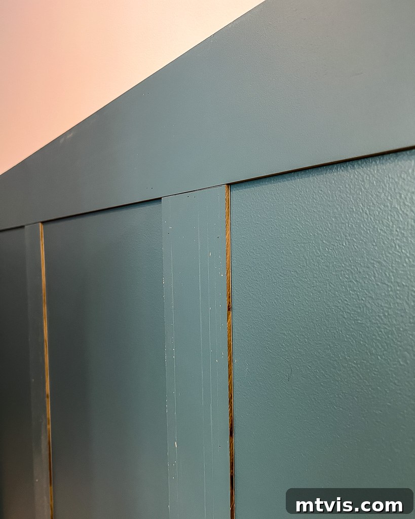 Effortless Board and Batten Accent Wall DIY 11 Before and after comparison of a hallway with a professional board and batten accent wall