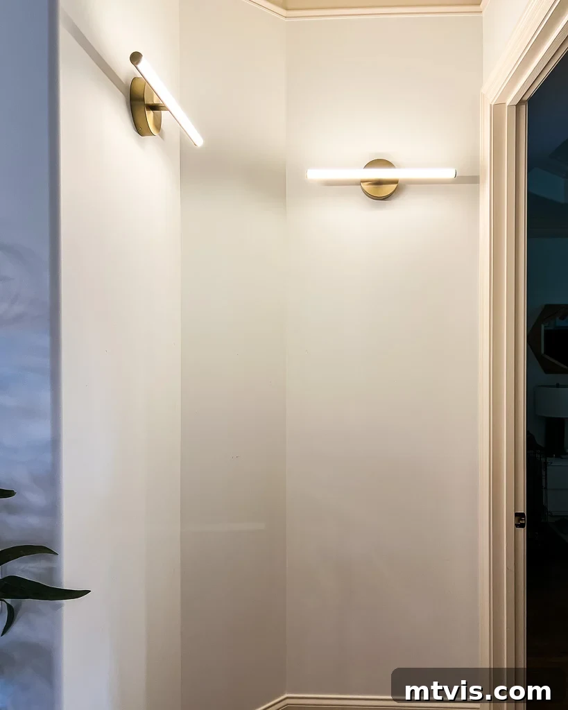 A blank, white wall in an alcove before any decor has been added, representing the 'before' state of the space.