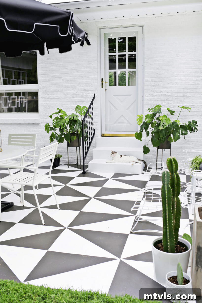 Unlock Your Porch's Potential: Designer Decor Secrets 13 painted concrete patio featuring a black and white tile pattern
