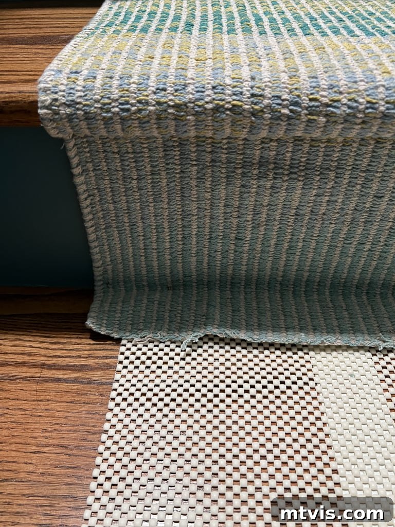 Ultimate Guide to Stair Runner Installation 14 Cutting the end of the first stair runner to prepare for joining with the next runner.