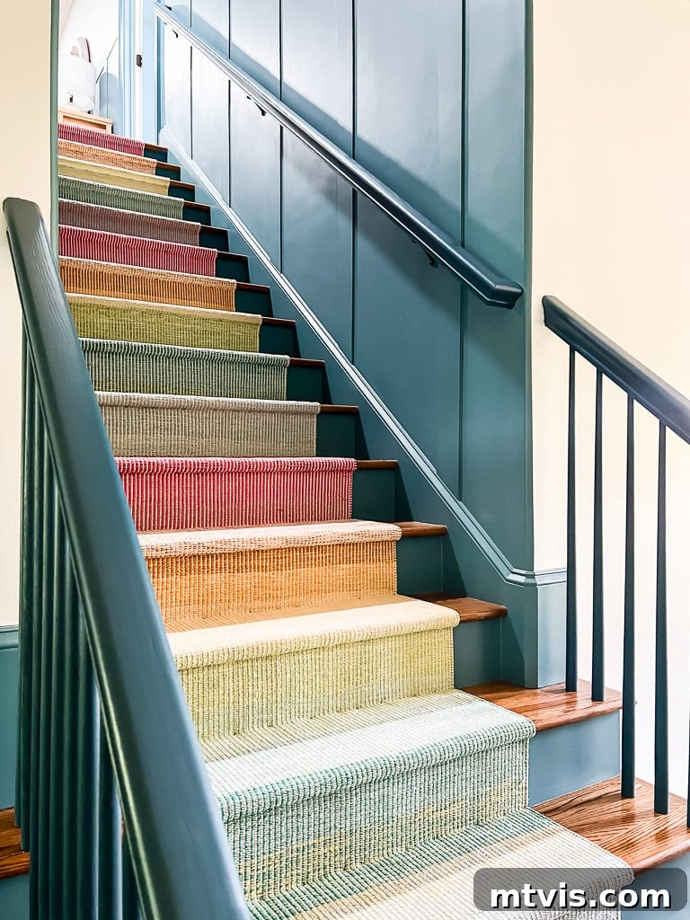 Ultimate Guide to Stair Runner Installation 23 Close-up photo of a DIY stair runner installed, showing the visibility of staples on the cotton weave.