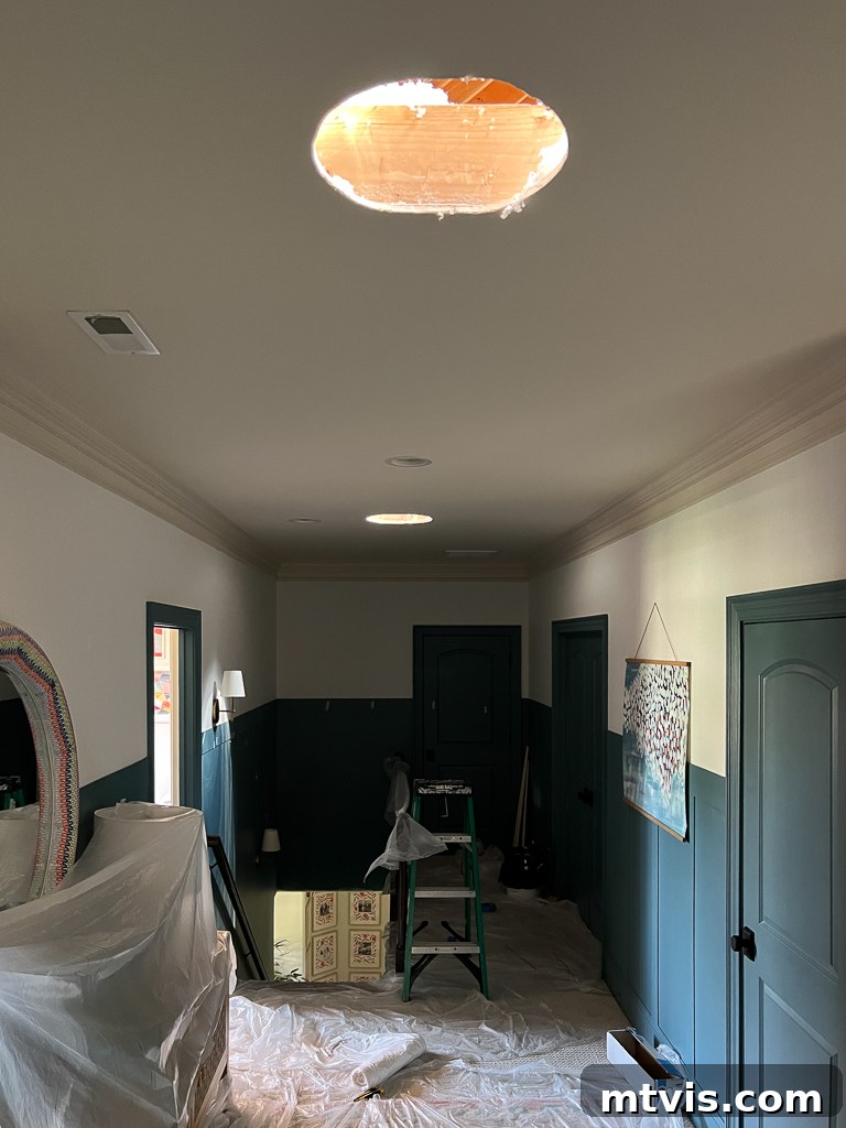Sun Tunnels A Smart Addition To Your Home 7 Interior view of a Velux sun tunnel being installed, showing initial light entry before reflective tube is attached.