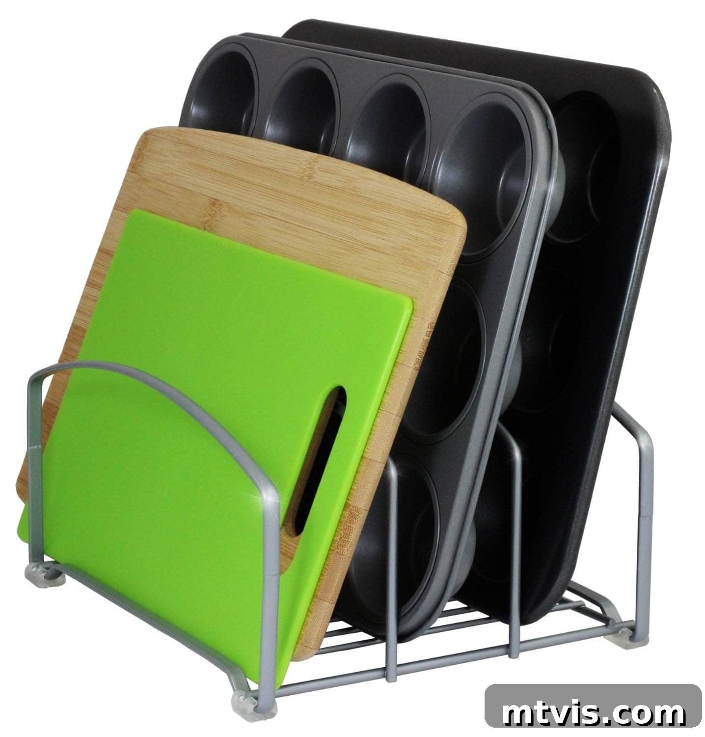 Everyday Kitchen Cabinet Organization 17 A cookie sheet and cutting board organizer holding various cutting boards and muffin tins against a white background.