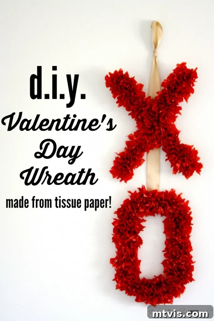 Valentines Door Decor DIY 2 A beautifully crafted, fluffy tissue paper Valentine's Day wreath in red and white 'XOXO' design, hanging gracefully.