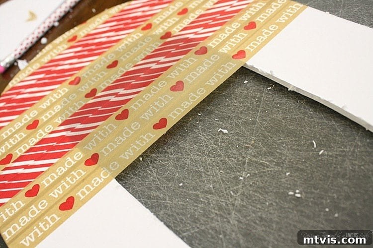 Valentines Door Decor DIY 8 Close-up view of the foam core edge being neatly sealed with washi tape.