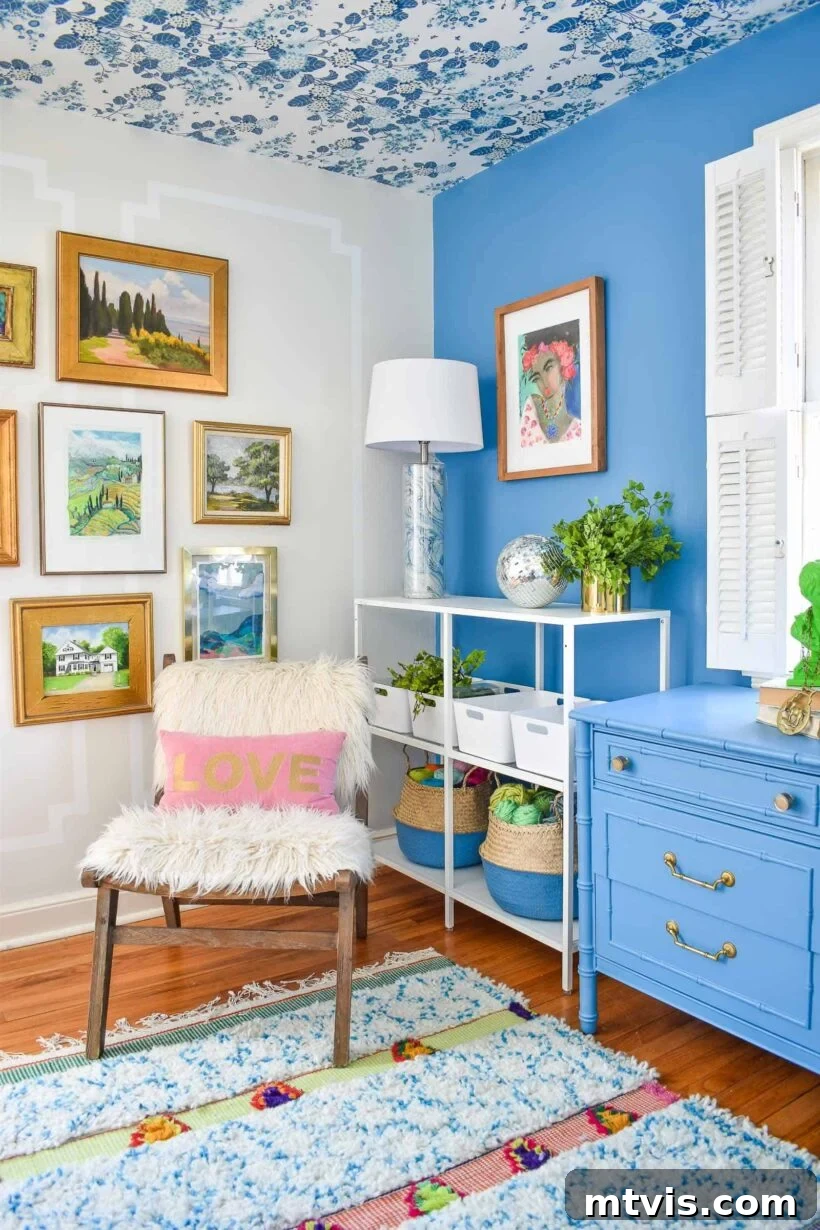 Vibrant blue accent wall in an office, painted with Behr Jet Ski, integrated with lighter blue decor.