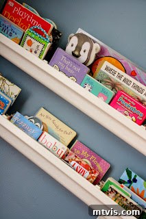Creative Rain Gutter Bookshelves DIY rain gutter bookshelves showcasing children's books