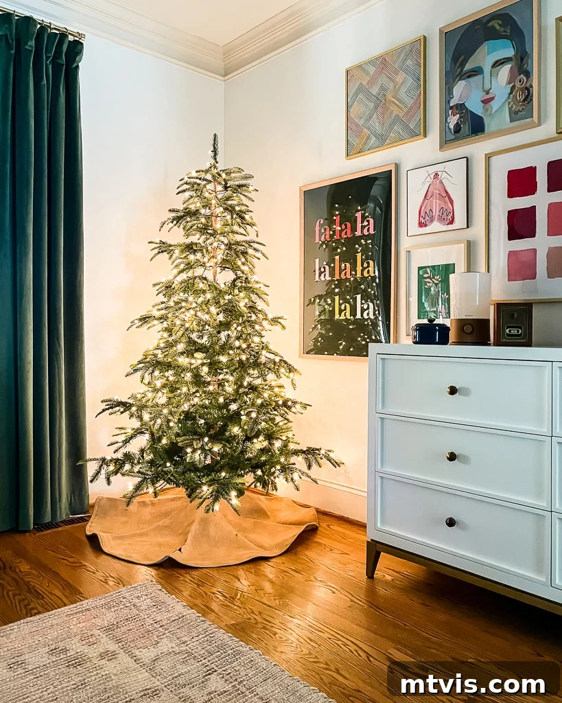 Create a Cozy Christmas Bedroom Retreat 4 A corner of a bedroom featuring a beautifully lit, unadorned Christmas tree, adding a serene and festive touch to the holiday decor.