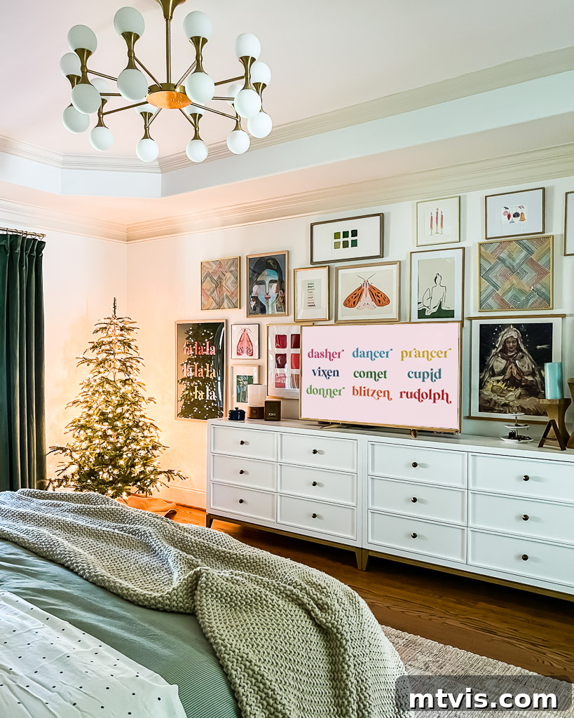 Create a Cozy Christmas Bedroom Retreat 6 A curated gallery wall in a Christmas bedroom, featuring diverse holiday-themed art prints, including 'Fa La La' and watercolor designs, blending seamlessly with the festive decor.