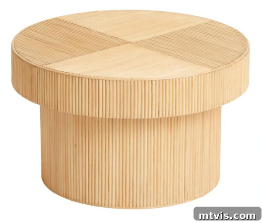 World Market Rattan Cyrus round coffee table, perfect for a bohemian or natural living space