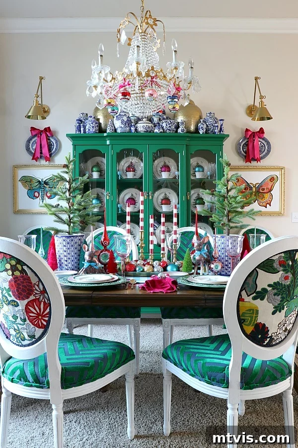 Vibrantly colorful dining room, playfully decorated for Christmas with unique ornaments and festive accents.