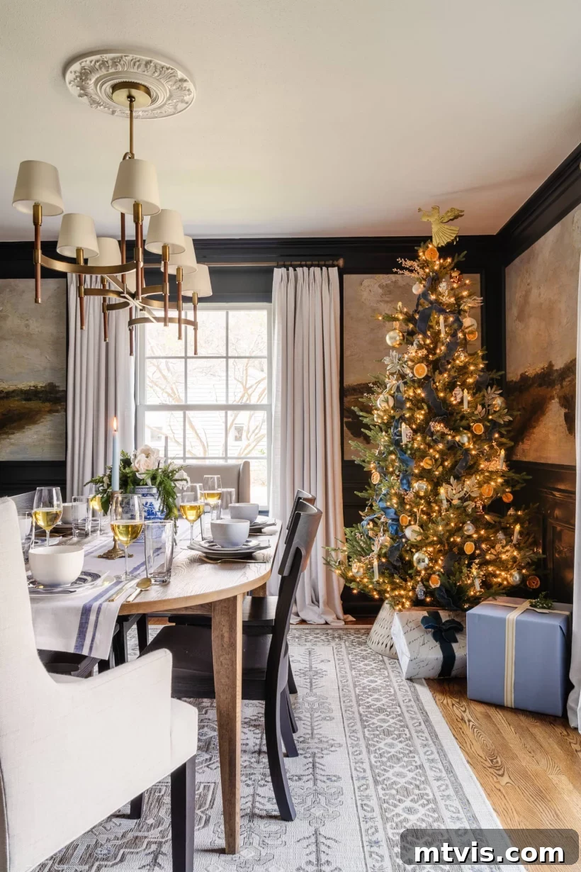 Elegant dining room decorated for Christmas, featuring a beautifully adorned Christmas tree as a central focal point.