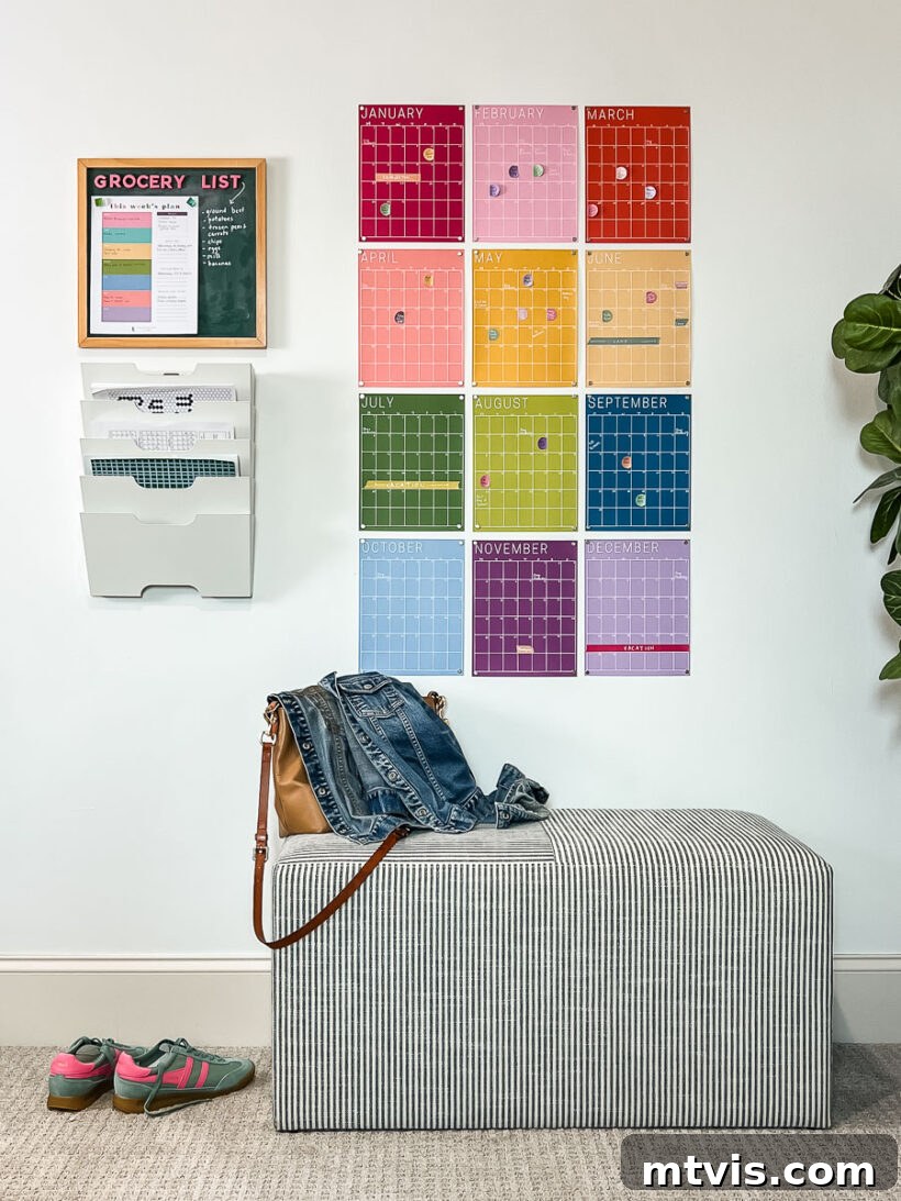 Conquer Family Chaos: Calendar Strategies for a Peaceful Home 4 A vibrant colorful family calendar from Kaleidoscope Living, featuring a modern rainbow design, integrated seamlessly into a well-organized family command center.