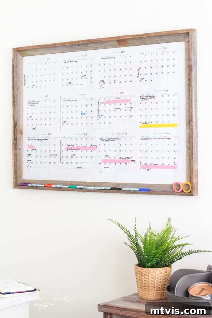 Conquer Family Chaos: Calendar Strategies for a Peaceful Home 8 A spacious DIY dry-erase family wall calendar featuring a full-year layout, providing a clear and comprehensive overview for long-term planning.