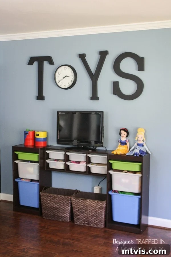 Playful and Chic Playroom Design Guide 29 Black papier-mâché letters spelling