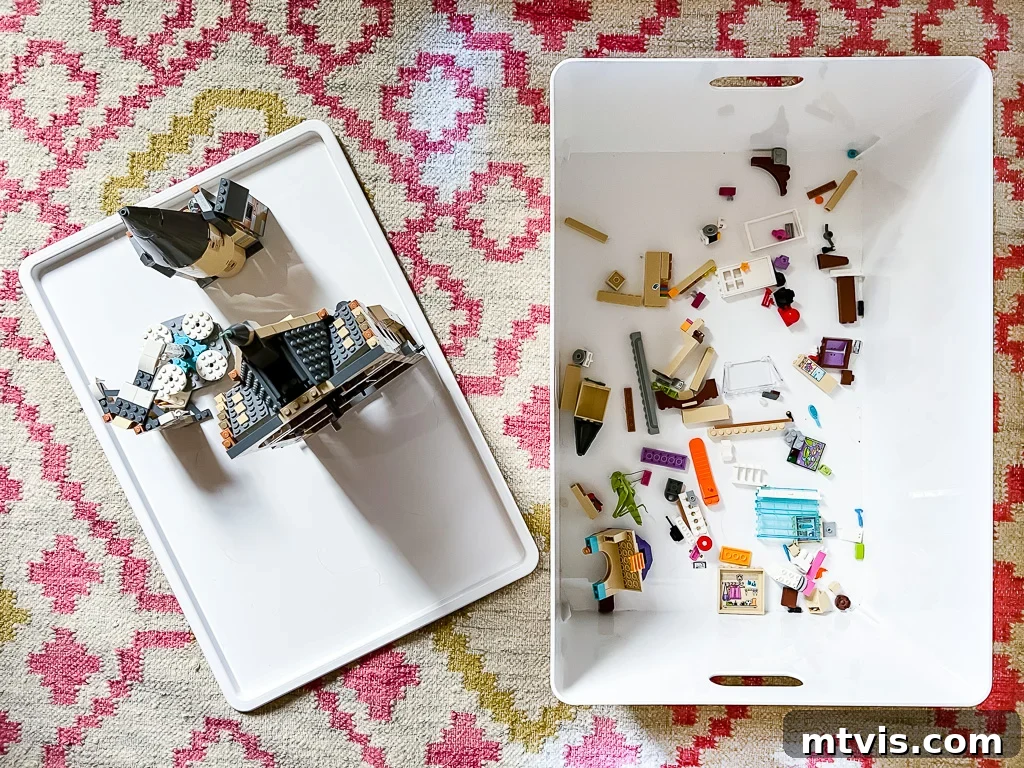 Playful and Chic Playroom Design Guide 8 A plastic white bin and cover, as seen from above, are easy storage for LEGO and more.