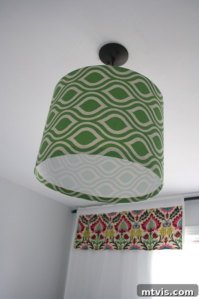 Detailed view of the custom fabric and construction of a DIY pendant light