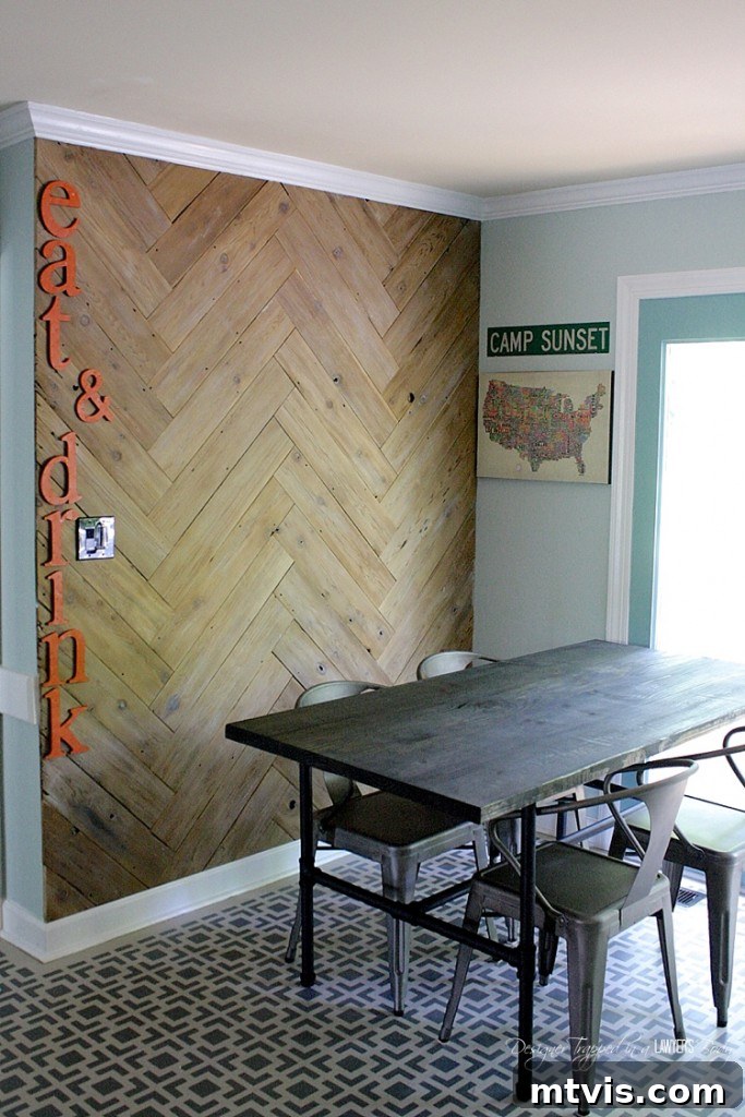 Close-up view of the intricate stencil pattern on the newly painted floors. A testament to patience and careful execution, these DIY stenciled floors provide a durable and stylish alternative to expensive refinishing.