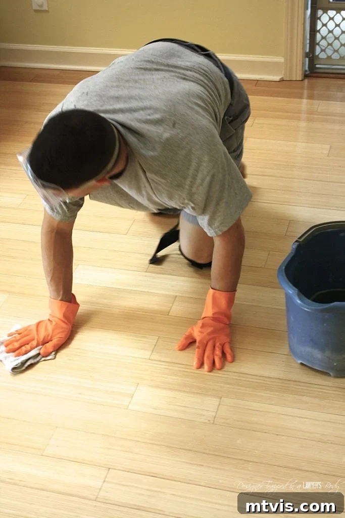 Thorough floor preparation is key for DIY stenciled floors. Cleaning with TSP removes all grime, ensuring optimal paint adhesion and a durable finish for your transformed space. Essential steps for damaged wood floor makeovers.