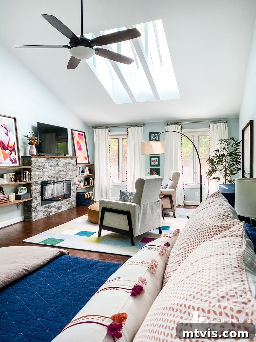 The Fifth Wall: Stunning Ceiling Designs 10 Velux skylights in bedroom with exposed joists, creating a cozy atmosphere