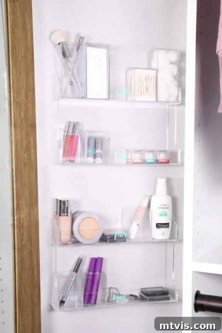 Clear hanging shelves on a door for makeup and small bathroom accessories