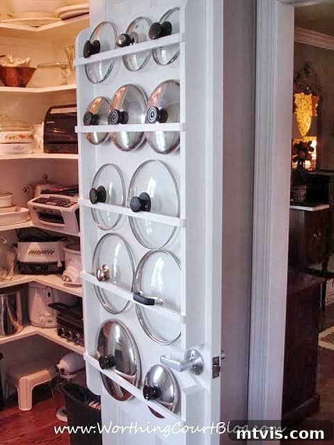 DIY pot and pan lid storage on the inside of a pantry door