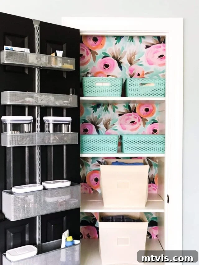 Elfa door storage system organizing items in a linen closet