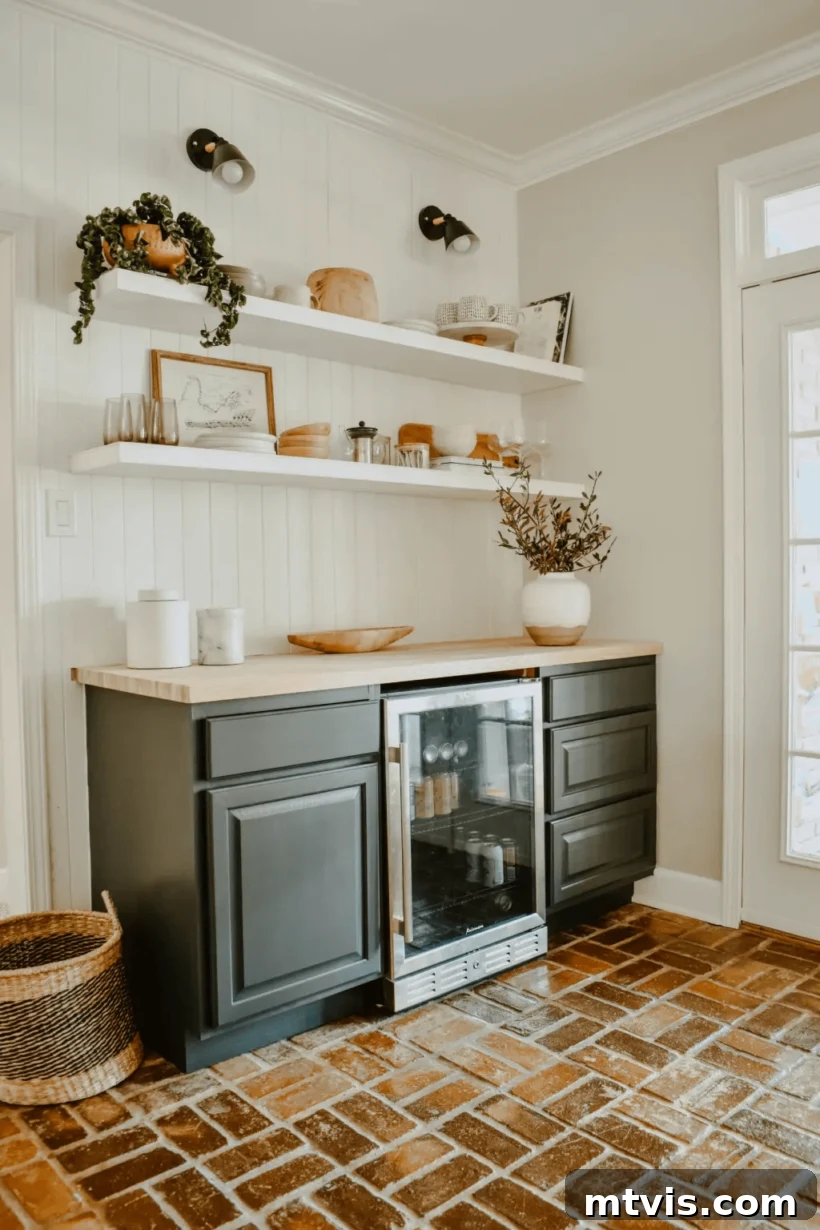 DIY built-in dry bar with paneling, open shelving, and integrated refrigerator