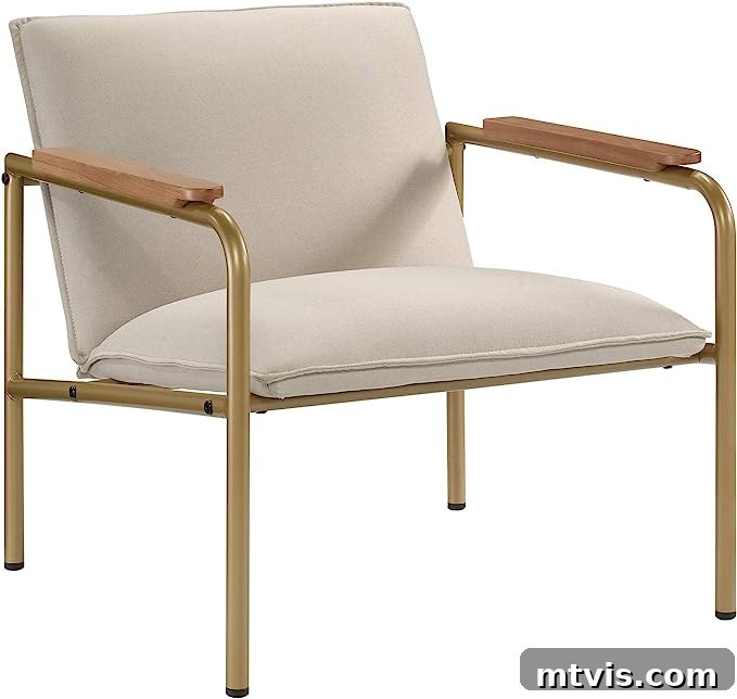 Score Stylish Accent Chairs on a Budget 9 A modern accent chair featuring a gold frame, wood armrests, and French seam cushions, priced under $150 on Amazon.