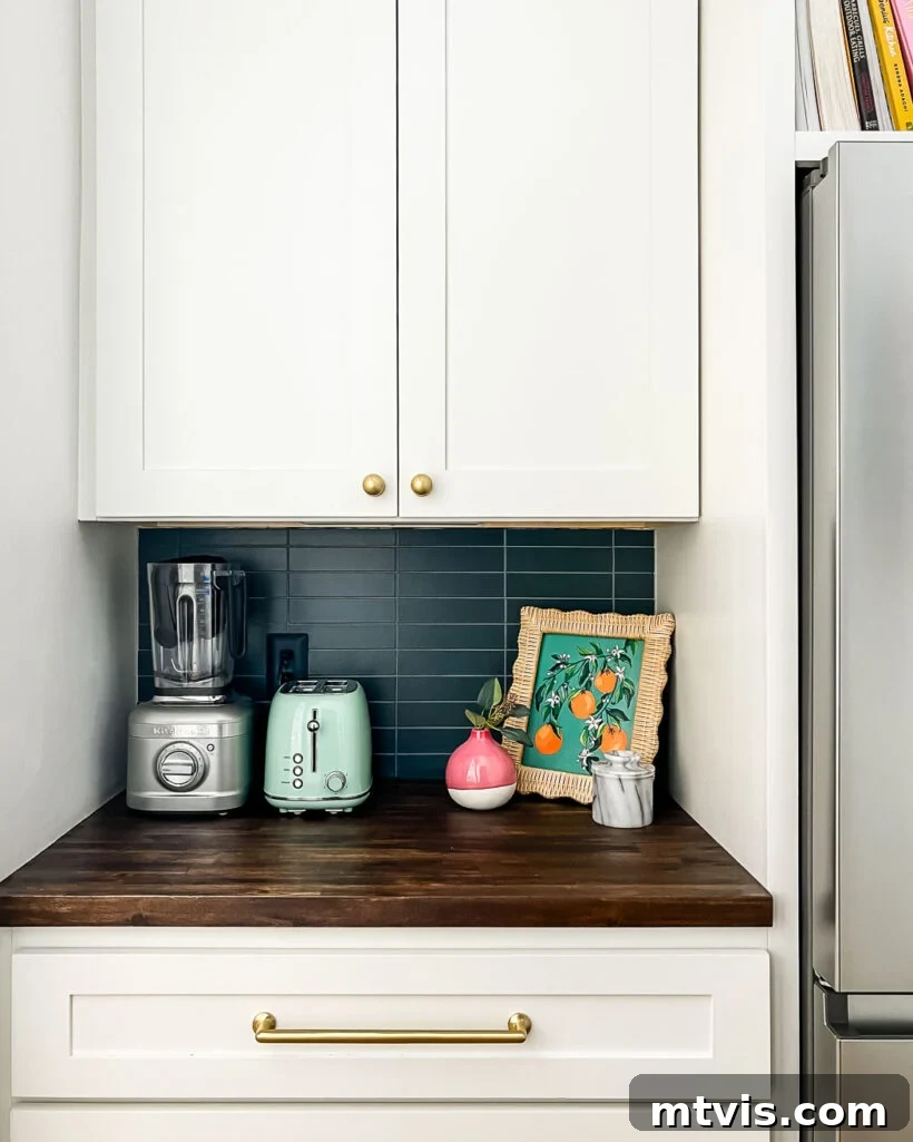 Close-up of a stylish navy tile backsplash in a newly installed butler's pantry.
