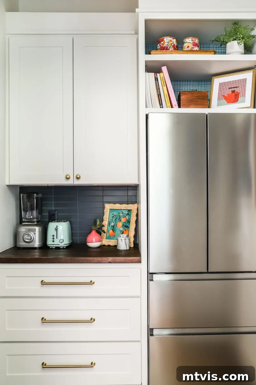After image of a beautifully transformed butler's pantry with new cabinets and decor.