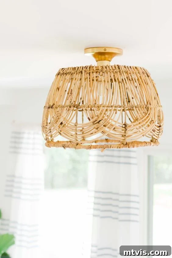 A DIY basket-style pendant light is shown against a white ceiling.