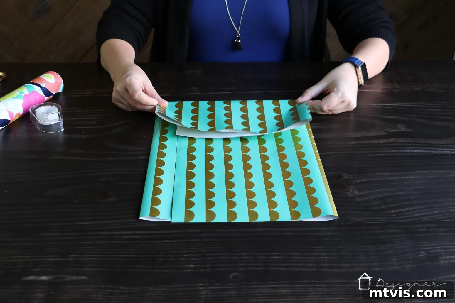 Upcycle Wrapping Paper into Custom Gift Bags 4 Folding the bottom edge of wrapping paper to create the gift bag base