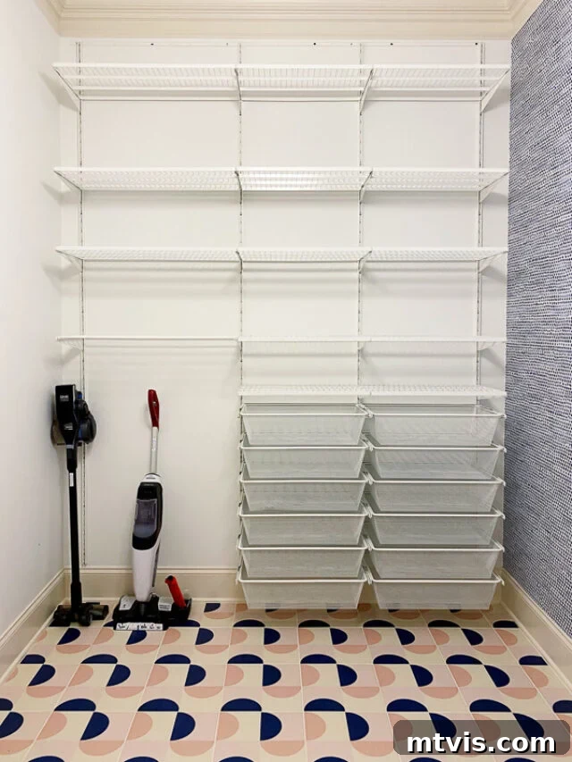 Transform Your Closets: 7 DIY Makeovers and Our Go-To Systems 14 Shelves, bin drawers, and a vacuum and a mop take all of a small wall in a laundry room.