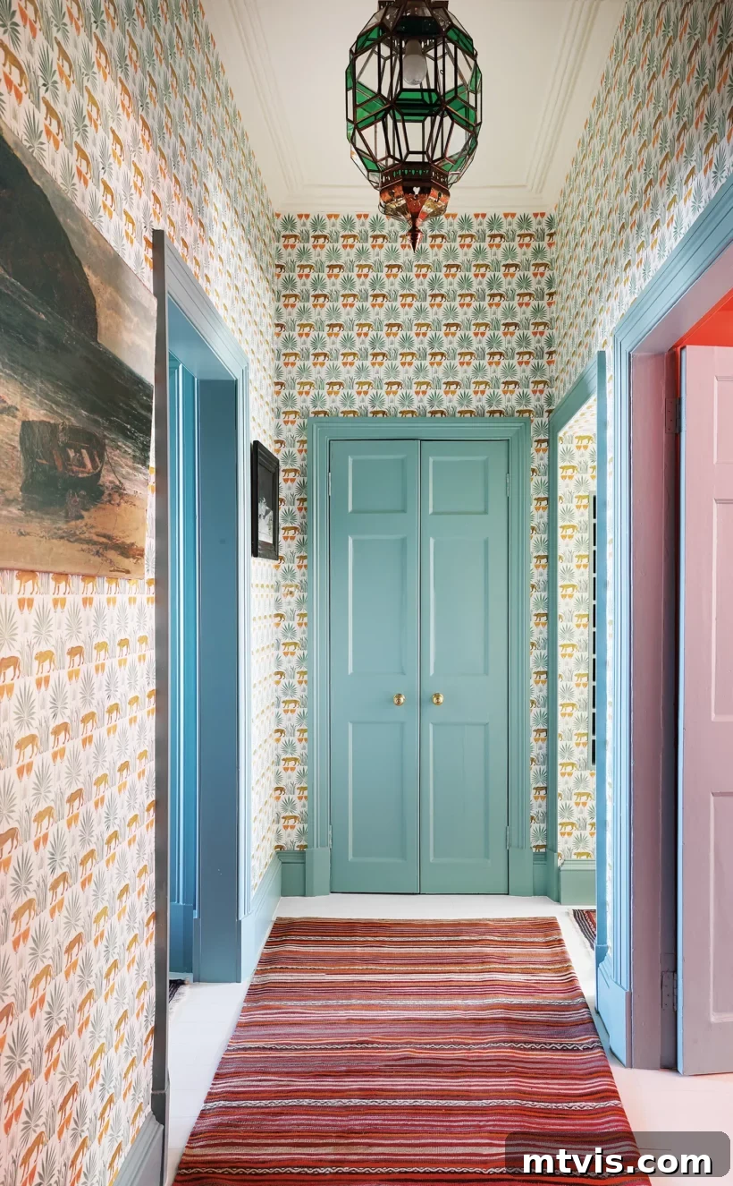 A whimsical hallway adorned with bold, magical wallpaper, creating an inviting and memorable transitional space.