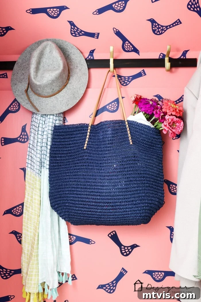 DIY wallpaper created with vinyl decals in a small closet, offering a removable and customizable design solution.