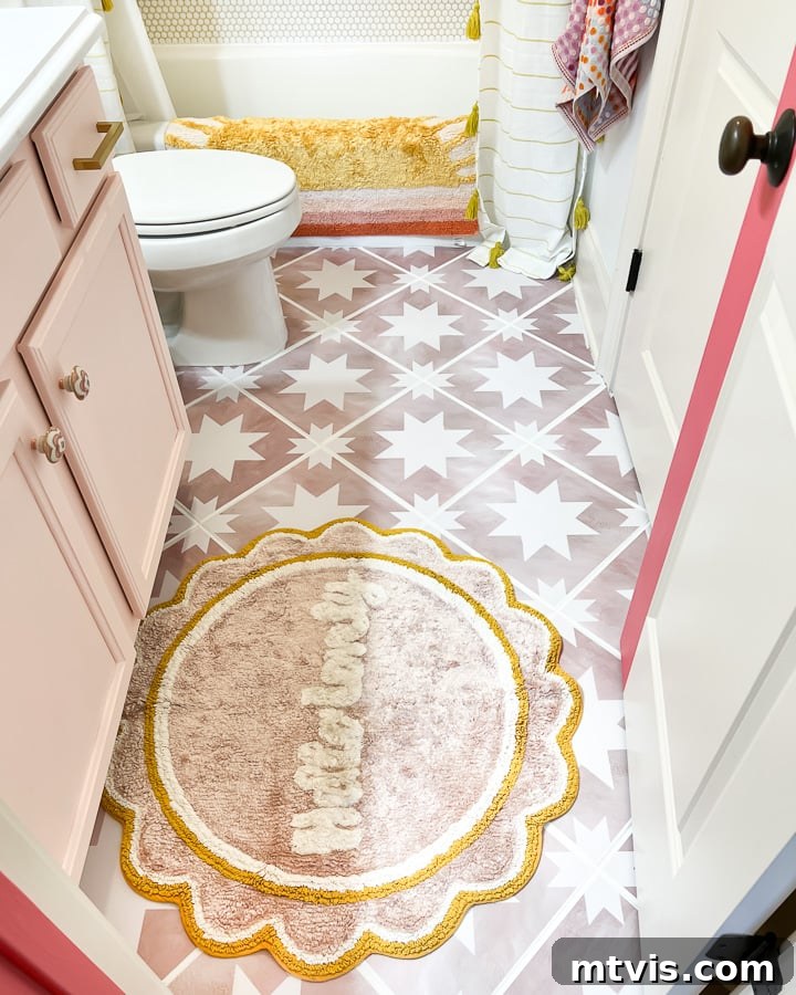 Vibrant tile stickers on the floor of a girl's bathroom, adding a playful and fresh look to the space.