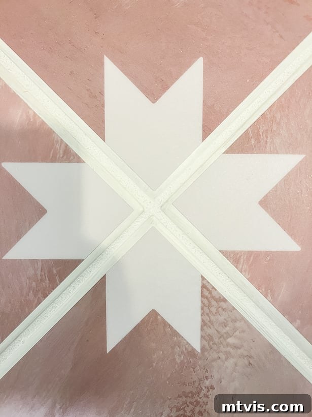 Floor tile stickers in a bathroom, showing a slight border around each sticker, preventing overlap with grout lines.