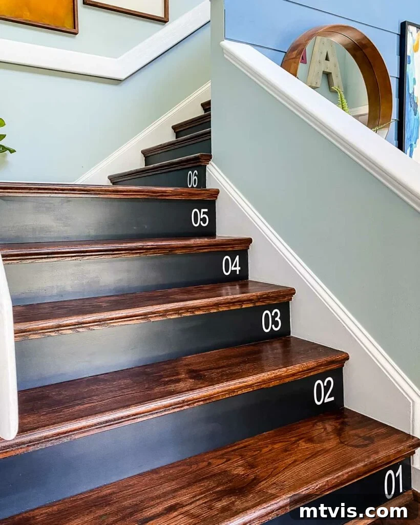 modern wood stairs after DIY carpet removal and installation