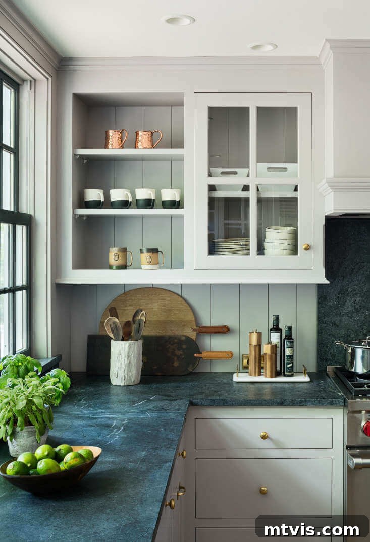 Elevate Your Kitchen with Timeless Neutral Cabinet Shades 13 Dove Tale by Farrow and Ball on kitchen cabinets with green countertops and open shelving