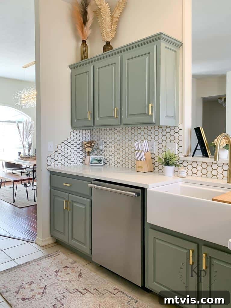 Elevate Your Kitchen with Timeless Neutral Cabinet Shades 17 Evergreen Fog by Sherwin Williams on kitchen cabinets