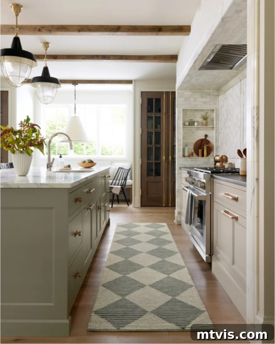 Designer Strategies for Stunning Kitchen Runner Rugs 8 A woven diamond kitchen rug runner in large muted green and neutral kitchen lays next to the island and oven.