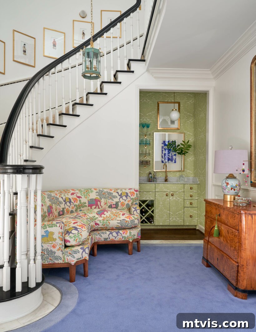 15 Stylish Stair Railing Concepts to Elevate Your Home 10 A colorful living room with blue carpet features a spiral staircase with a black rail and white spindles.