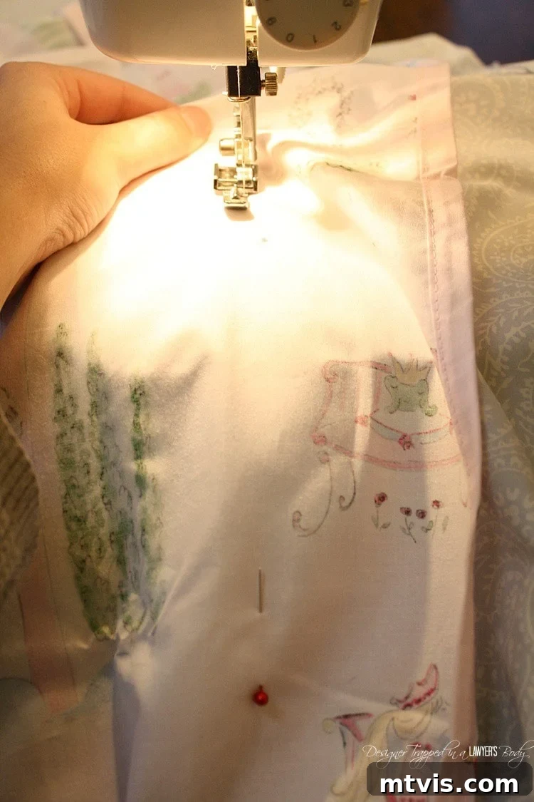 Sewing the top and side edges of the inside-out duvet cover sheets
